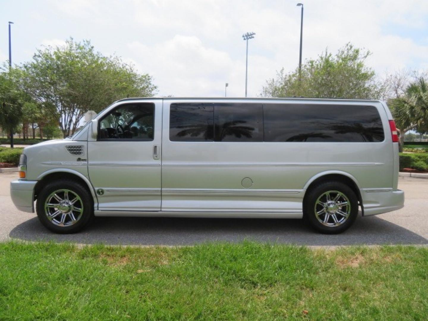 2014 Chevrolet Express (1GBWGLCG3E1) , located at 4301 Oak Circle #19, Boca Raton, FL, 33431, (954) 561-2499, 26.388861, -80.084038 - You are looking at a Rare 2014 Chevy Express 2500 Quigley 4x4 Four Wheel Drive Explorer Limited SE 9 Passenger Conversion Van with: 107K Original Miles, 6 Captain Chairs, Rear Power Folding Bench Seat Bed, Center Consoler Cooler, Front PPF (Paint Protection Film) Explorer Limited Conversion Througho - Photo#15